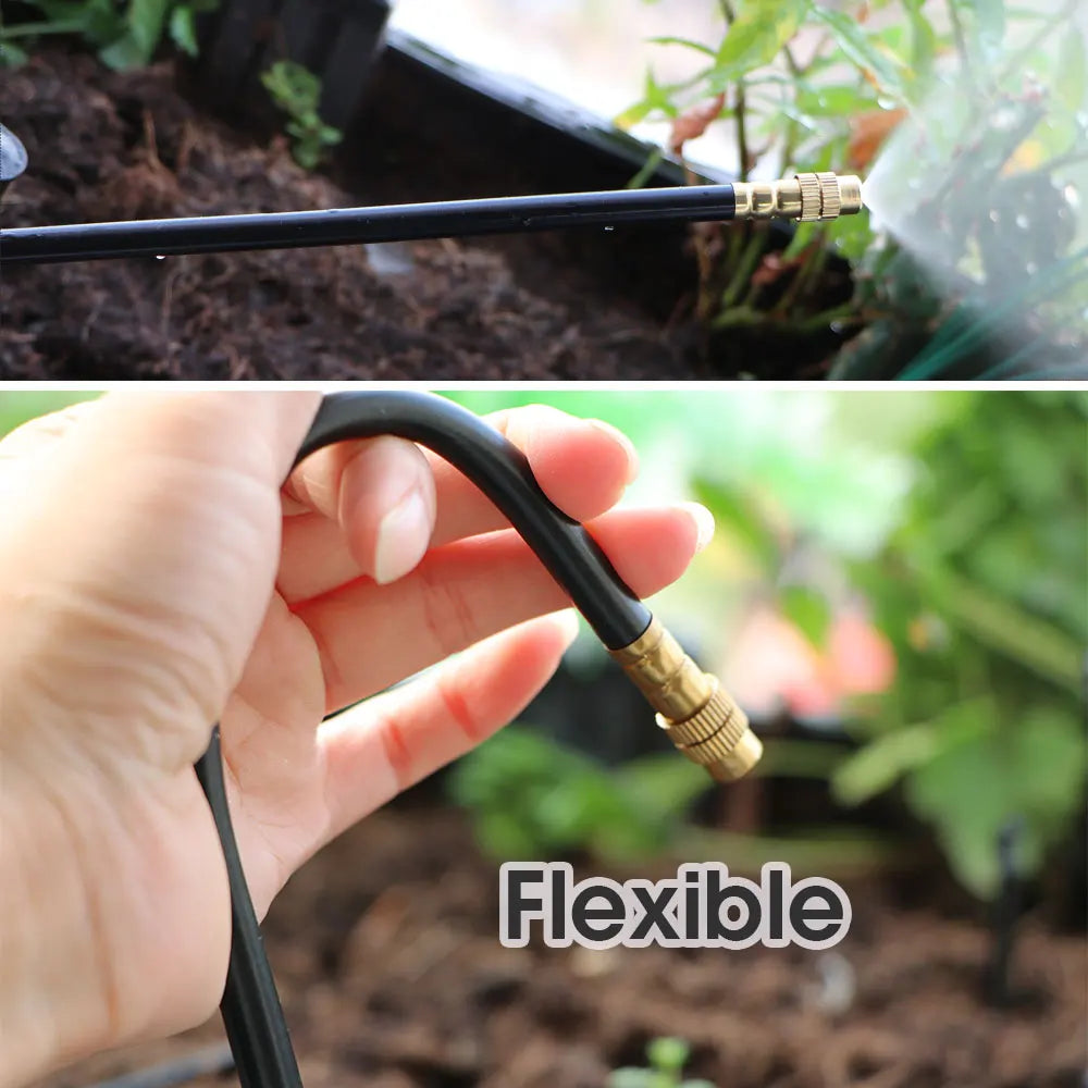 Flexible black hose with brass tip nozzle spraying fine mist for garden watering