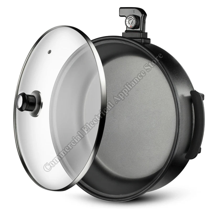 Electric non-stick hot pot with stainless lid and black cooking base, control module on top.