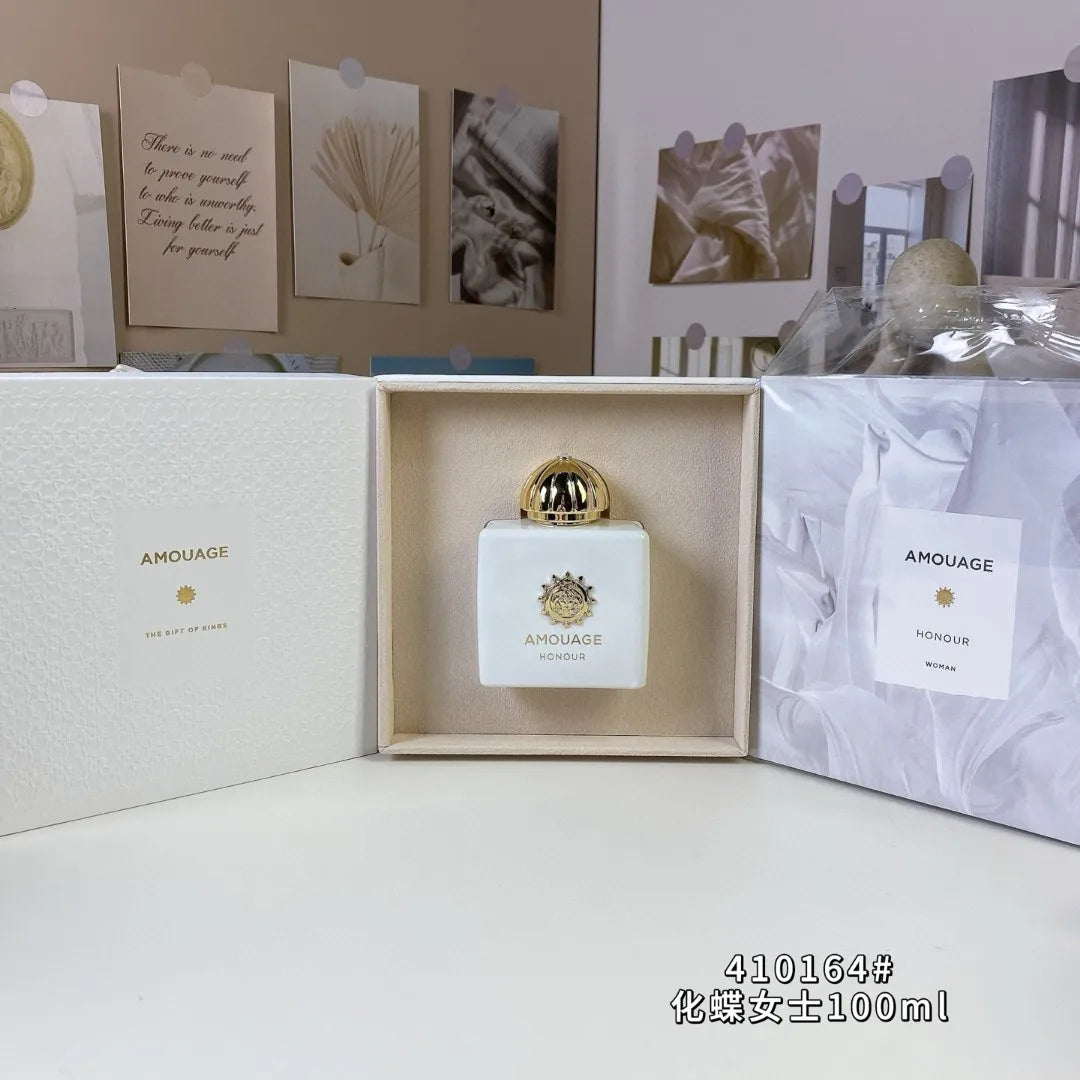 Amouage Honour Woman EDP 100ml: A sophisticated, long-lasting floral oriental perfume in a square white glass bottle.