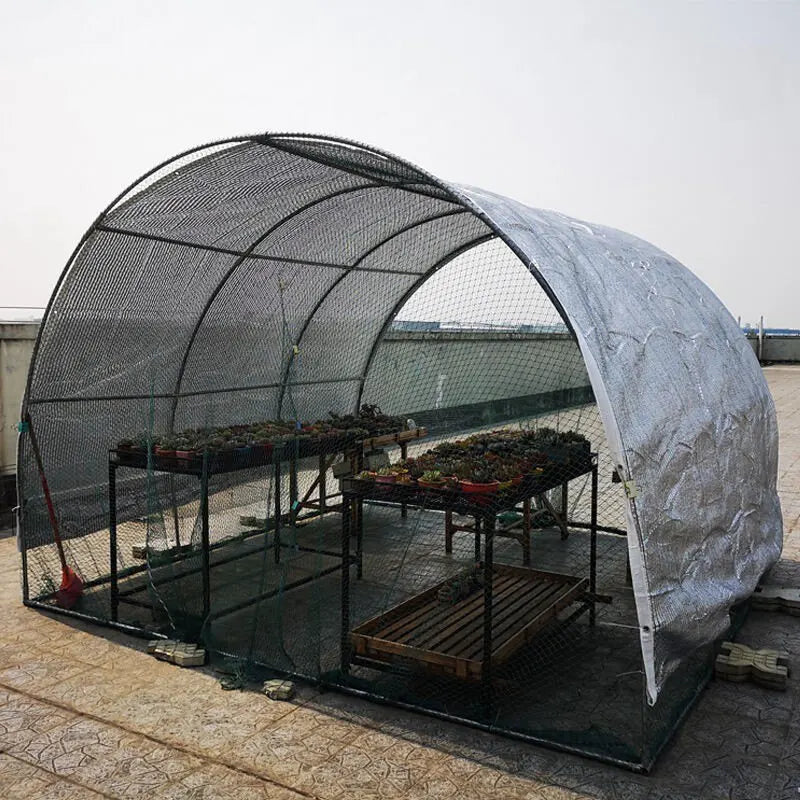 Arched greenhouse-style silver foil sunshade cover with mesh sides and top