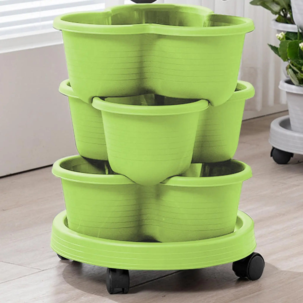 Light green stackable tiered planter tower with three pots on rolling wheels base.