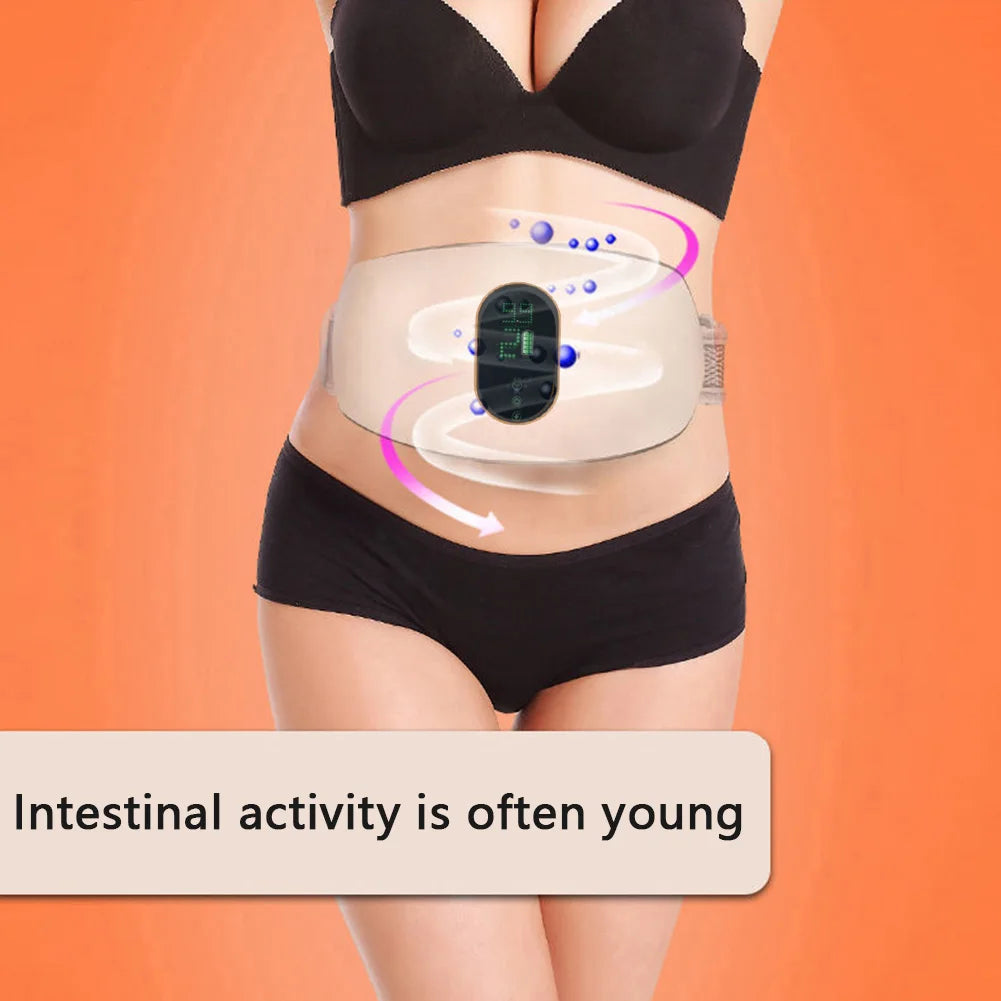 Beige electronic abdominal massage belt with a digital display, worn around the waist to aid digestive health.