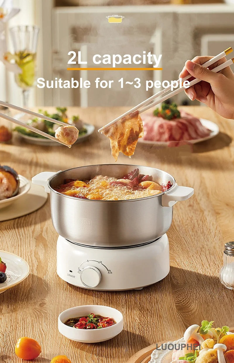 White electric hot pot with stainless cooking pot holding food, serving for 1 to 3 people