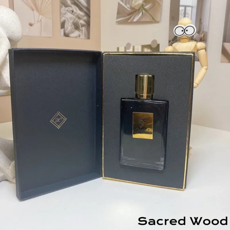 Kilian Sacred Wood unisex EDP, 50ml niche perfume. Rectangular black bottle, woody spicy scent in luxury gift box.