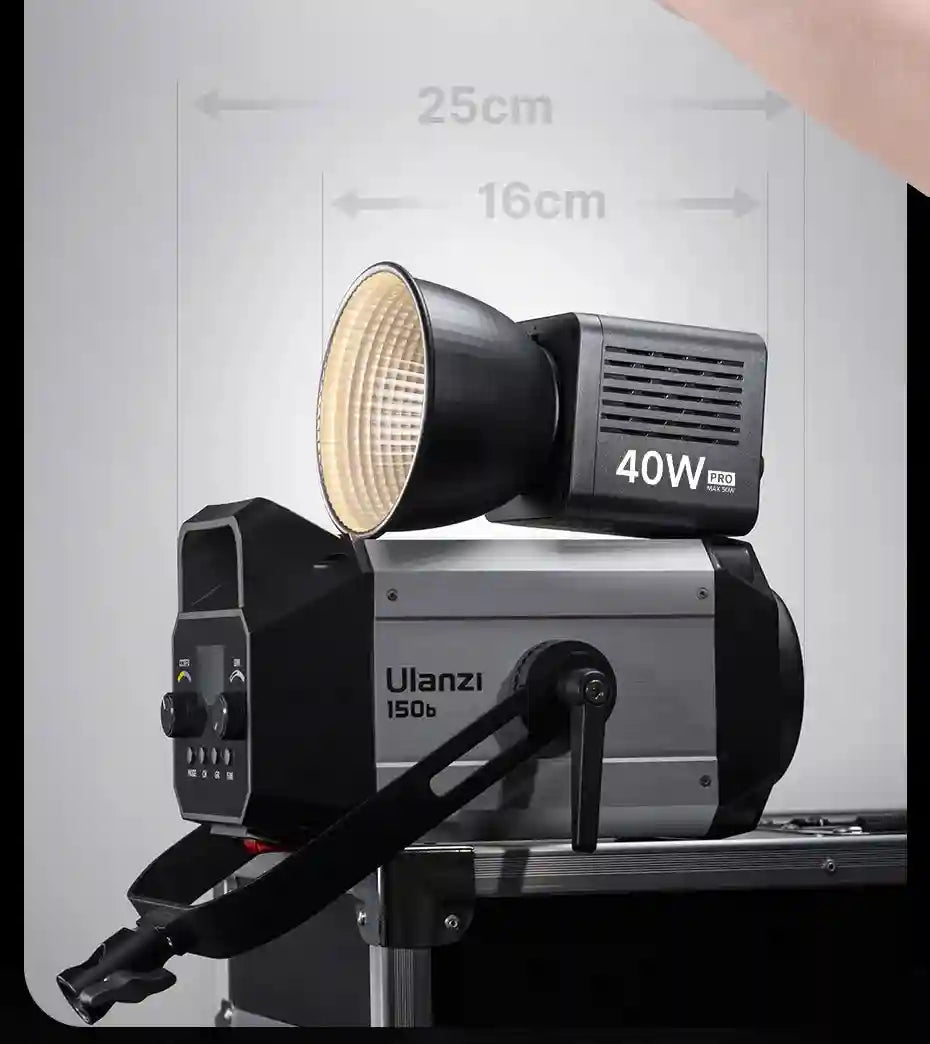 A 150b studio LED light with a 40W PRO reflector attachment. Black and silver metal build for photography lighting.