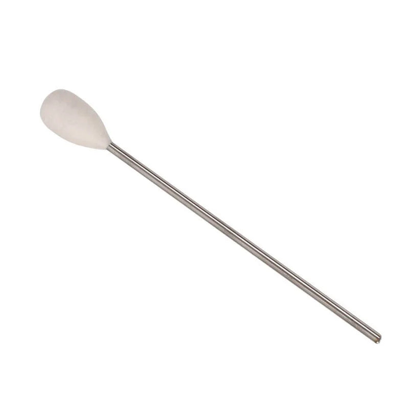 Metal ignition rod with white cotton tip for fire cupping therapy, essential tool for professional glass cupping kits.