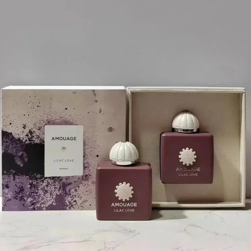 Amouage Lilac Love EDP: Luxury unisex oriental floral perfume in square mauve bottles with white domed caps in gift box.