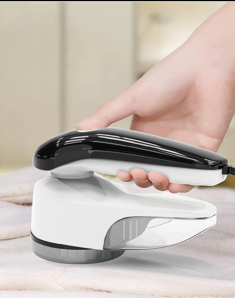 Tidesmit professional rechargeable fabric lint remover showing shaver head and blade detail for clothes care
