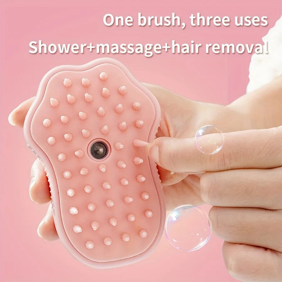 Pink 3-in-1 electric steam pet brush for grooming, massage, and hair removal. Soft silicone bristles for cats and dogs.