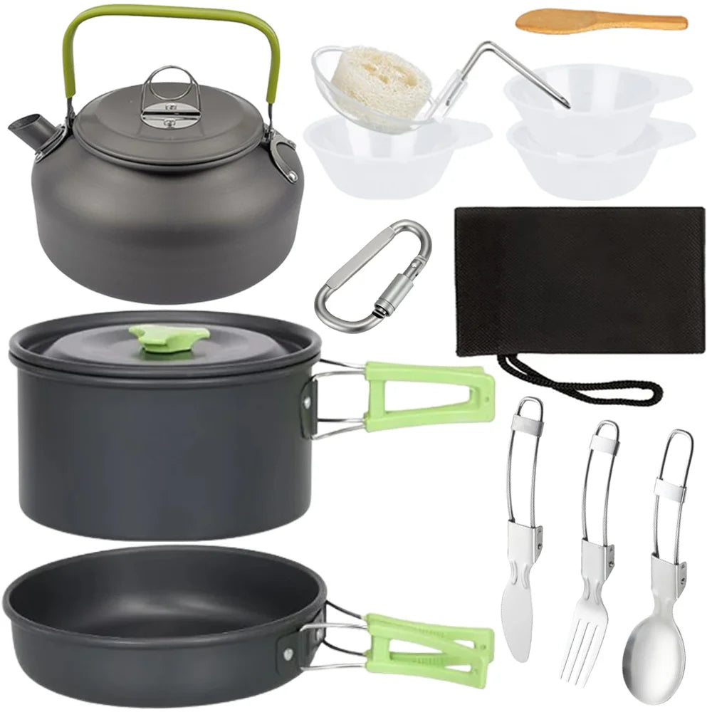 Aluminum camping cookware set with black kettle, nested pot, pan, and green utensil pieces
