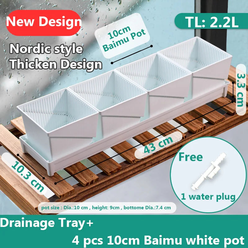 White Nordic-style drainage tray with four ribbed square succulent pots and one water plug