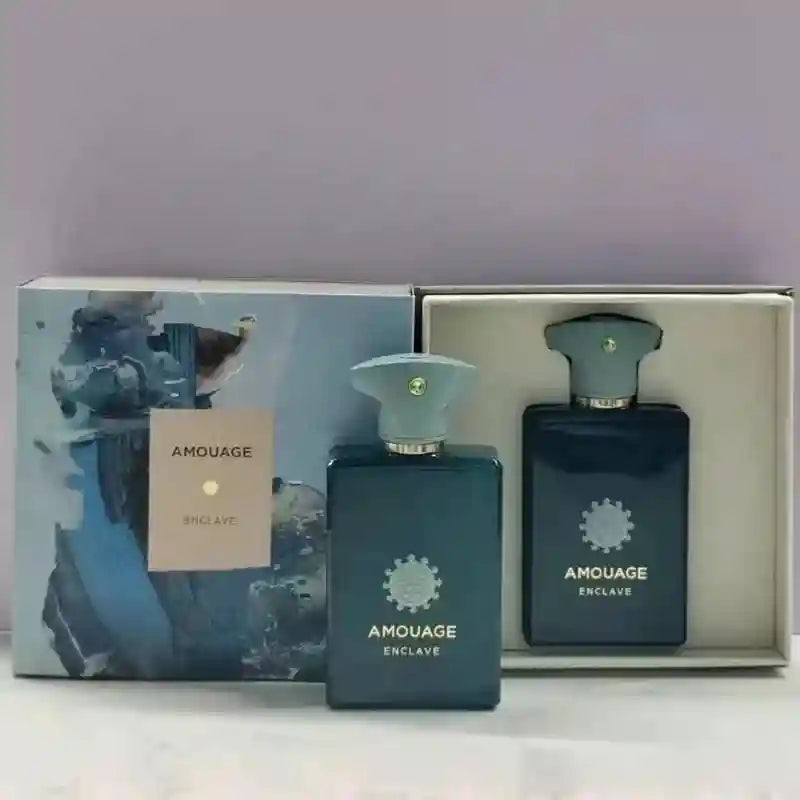 Amouage Enclave men’s EDP: dark blue rectangular bottle, woody aromatic fragrance in premium gift set box.