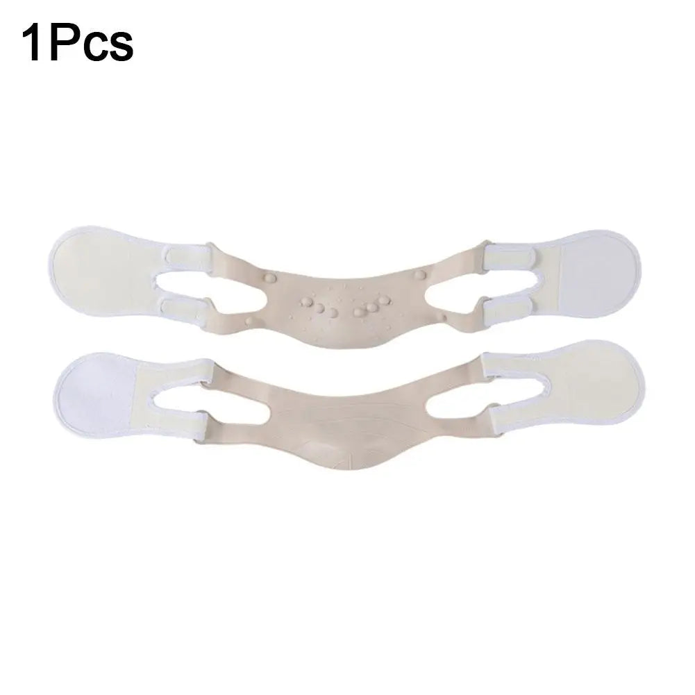 Two beige, contoured face-slimming straps with textured nodes and adjustable white hook-and-loop tabs.