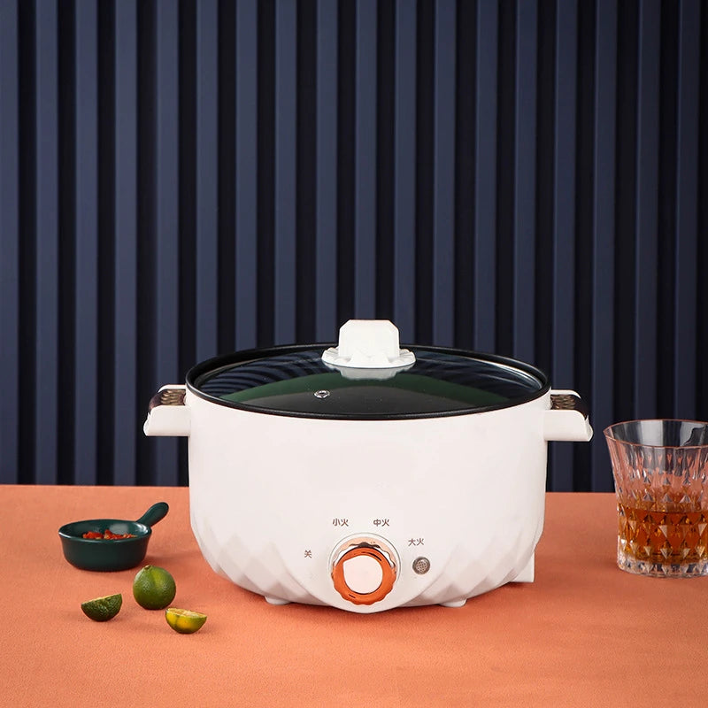 White electric hot pot multi-cooker with dark glass lid and side handles for serving