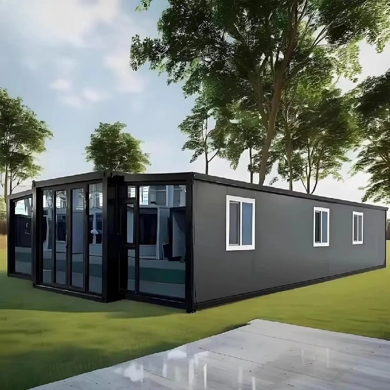 Steel prefab container house with dark frame and large sliding glass windows