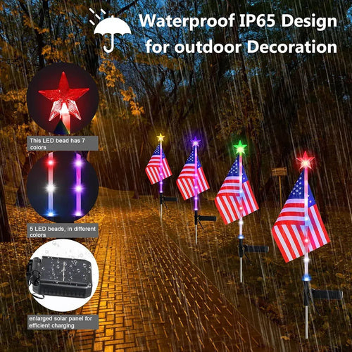 Four solar garden stake lights with American flags and lit star toppers line a brick path in the rain.