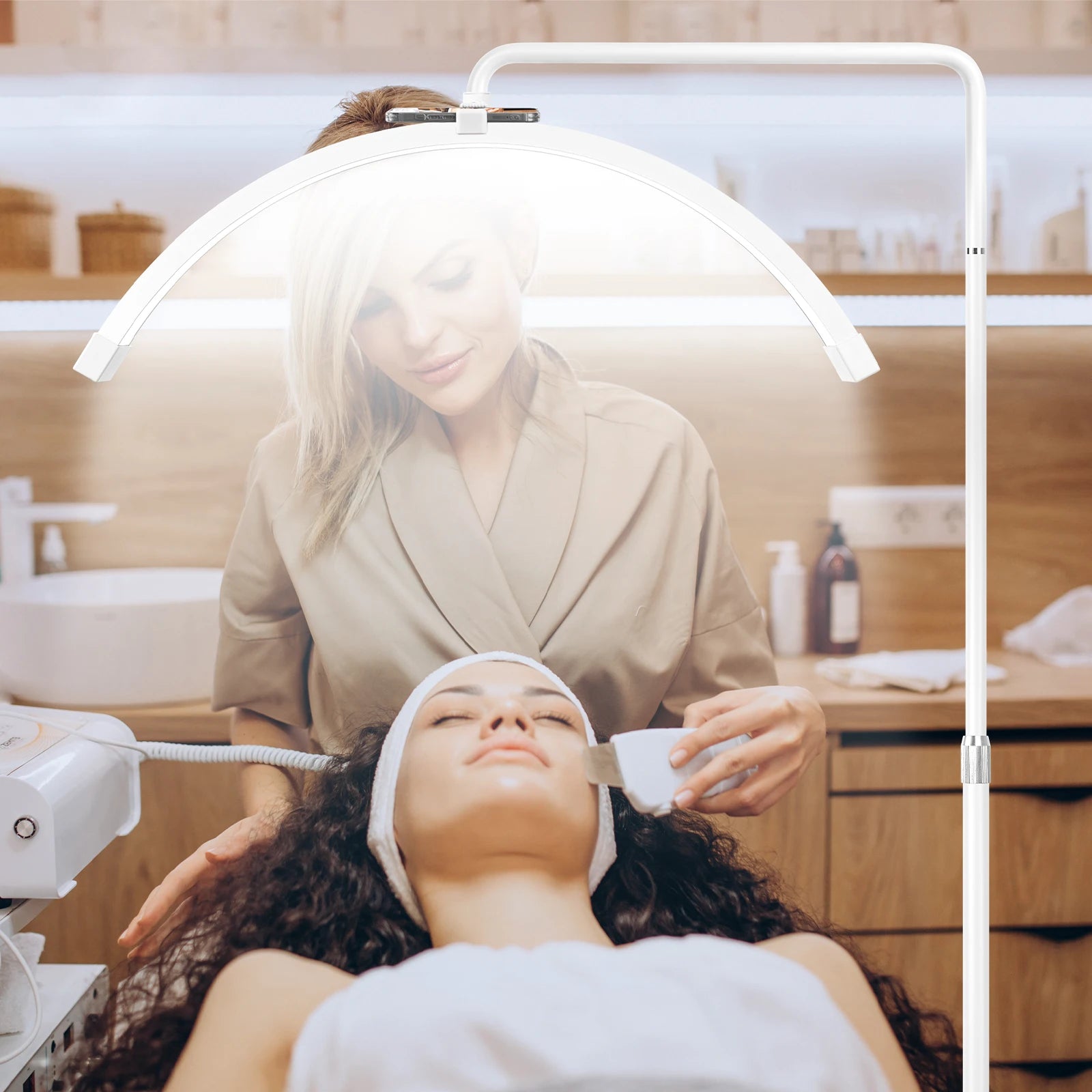 White metal floor lamp with a wide, arched LED head for professional beauty and facial treatments.