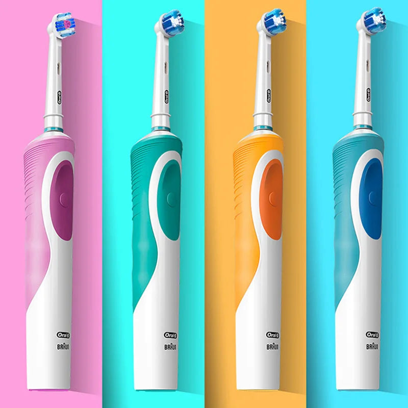 Tidesmit Oral B electric toothbrush showing inductive charging base and extra brush head features