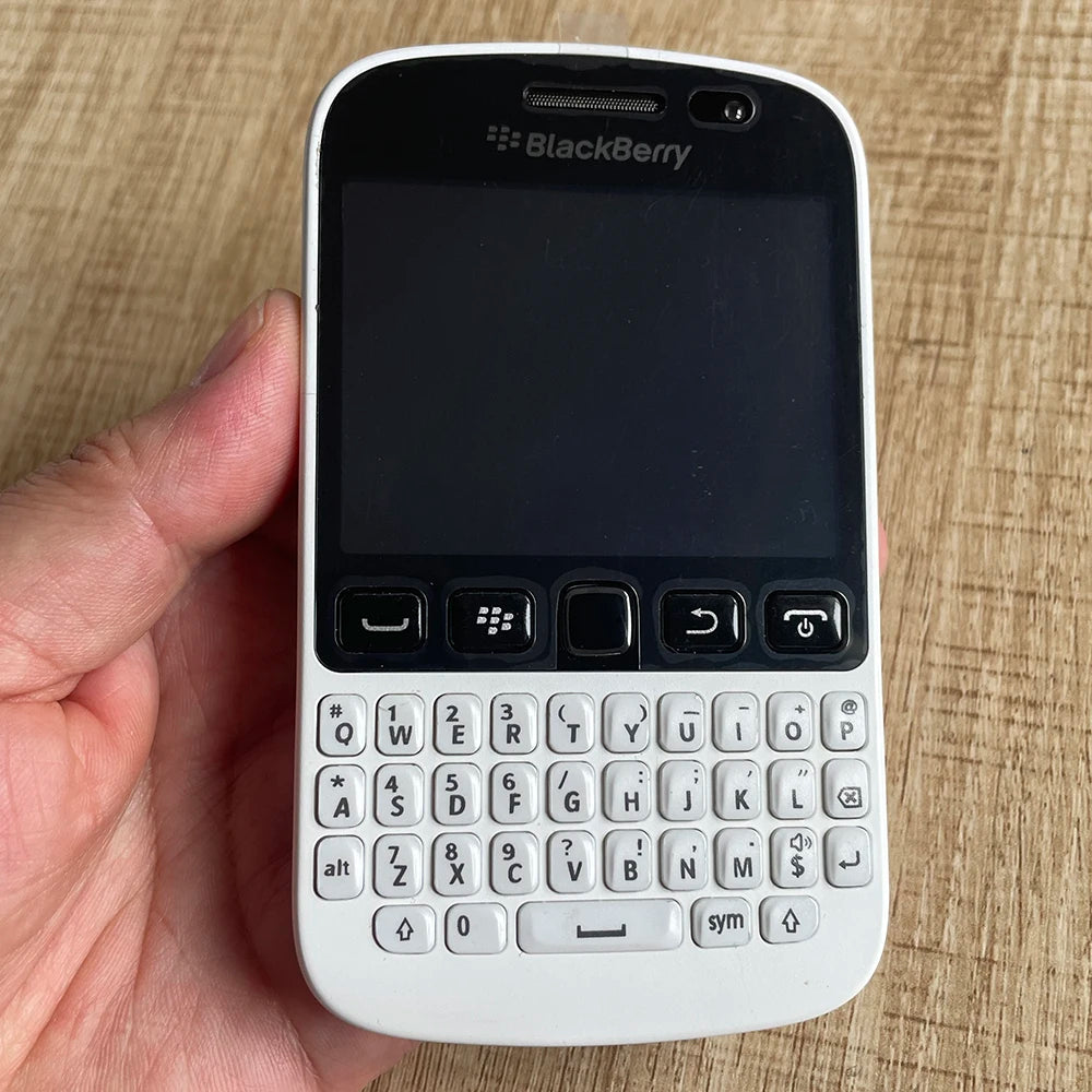 BlackBerry 9720 Samoa unlocked smartphone with white body and front QWERTY keyboard