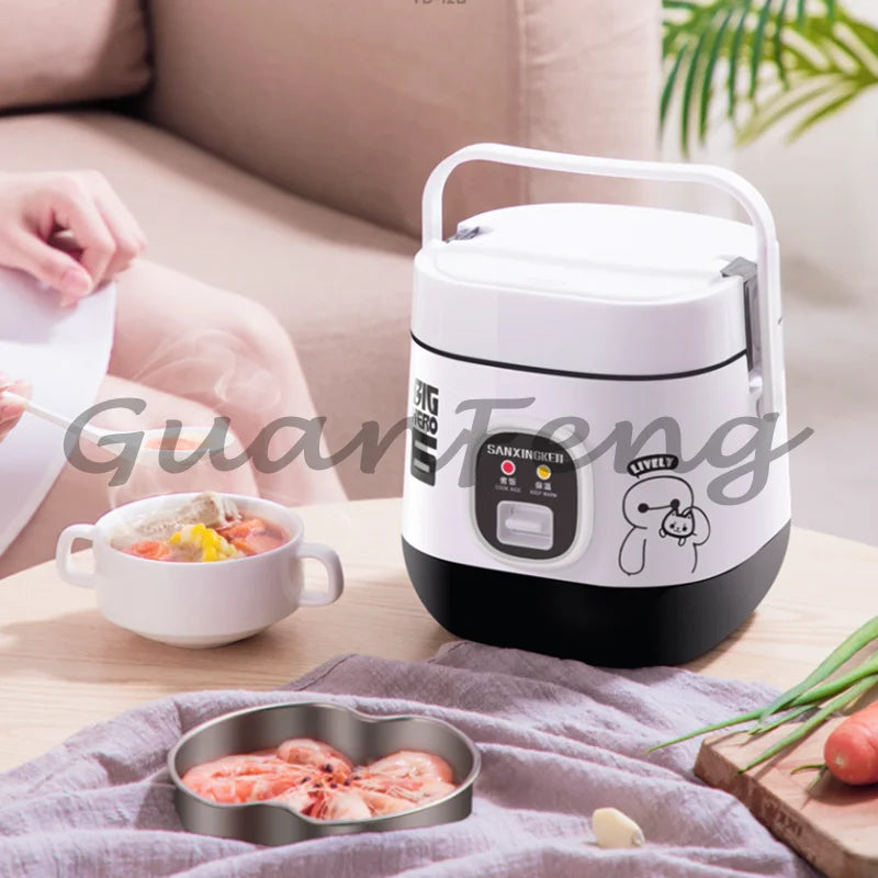 Portable mini rice cooker with carry handle, white body and black base next to meal bowl