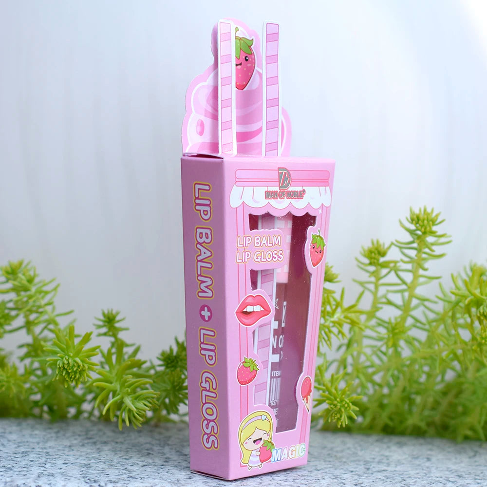 Cute pink ice cream themed lip balm and shiny lip gloss set in decorative strawberry packaging.