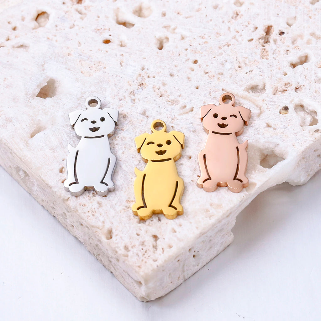 Set of 3 stainless steel dog charm pendants in silver, gold, and rose gold for DIY pet jewelry making.