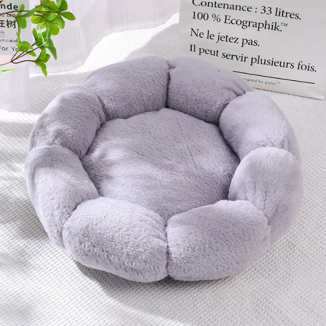 Grey orthopedic plush pet bed with rounded bolsters and soft center