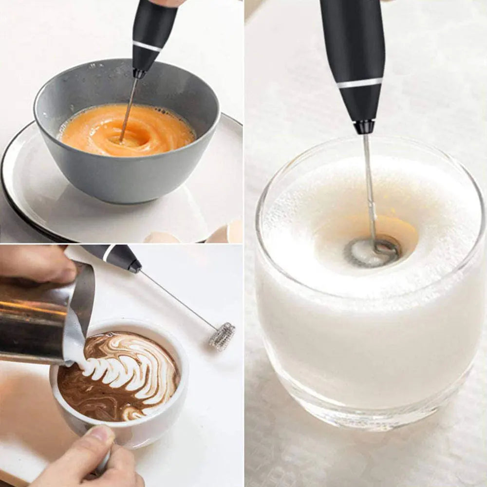 Handheld black electric milk frother and egg whisk with stainless steel whisk head frothing coffee and eggs.