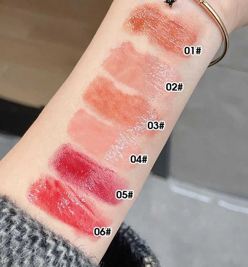 Gege Bear Floral Whisper lipstick swatches on arm, showing glossy, moisturizing, jelly-finish colors from 01 to 06.