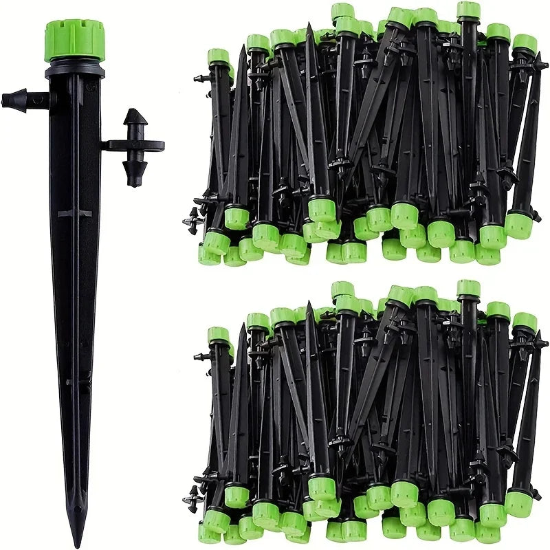 Bulk pack of black drip emitter stakes with green adjusters for garden watering