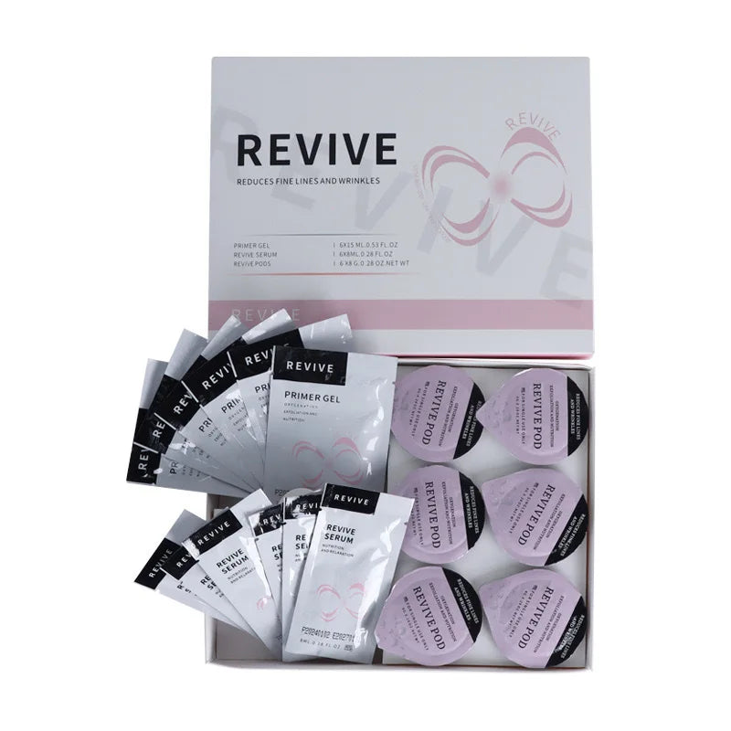 Revive facial skincare set with open white box, including primer gel sachets, serum packets, and six purple pods.