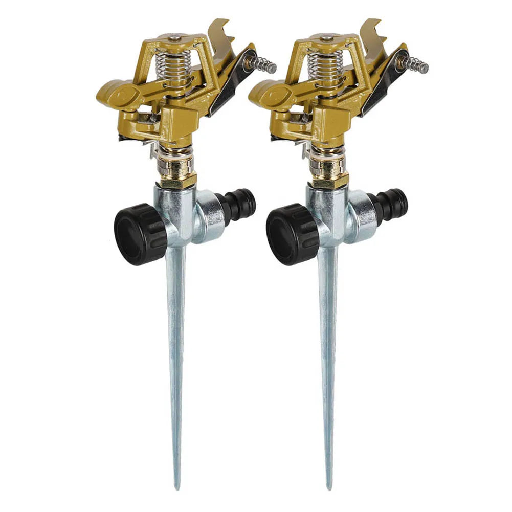 Two brass 360° garden sprinklers with black nozzles and metal stakes