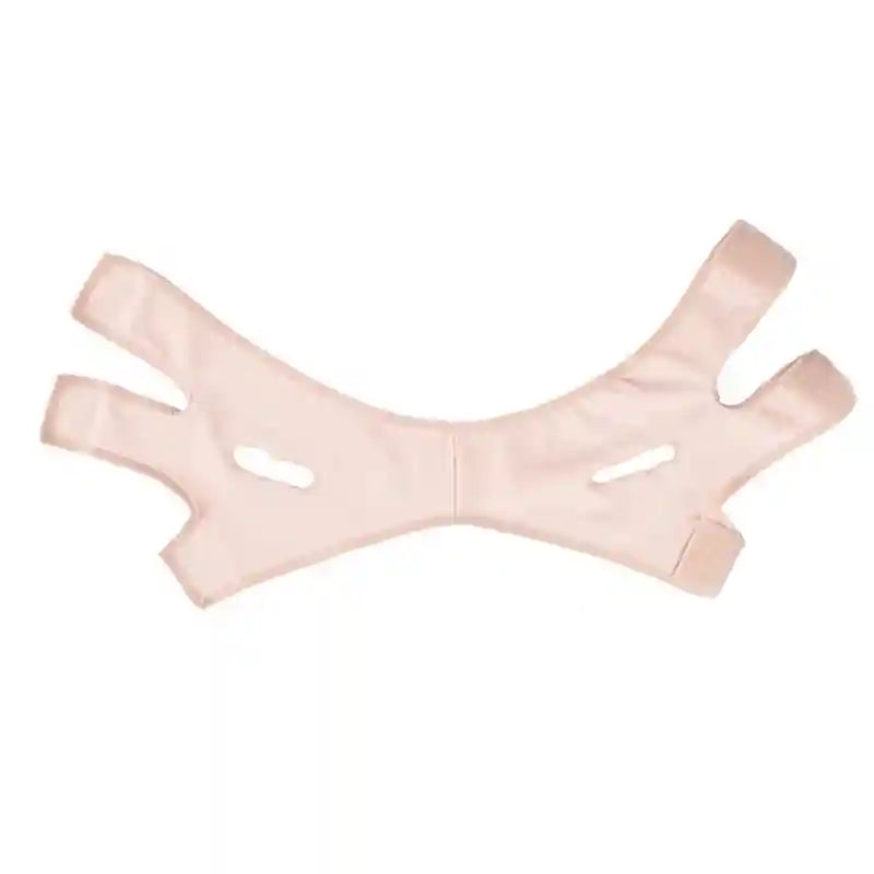 Light pink, elastic V-line face slimming strap with ear cutouts and adjustable Velcro fasteners on a white background.