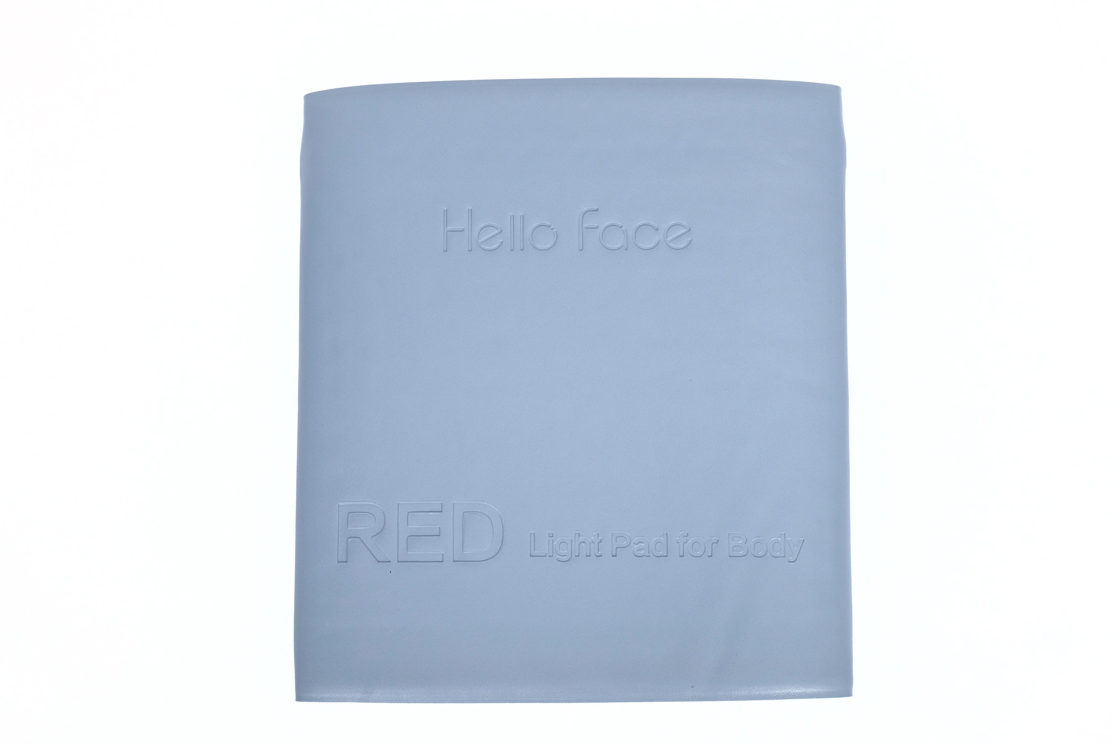 A large, rectangular, light blue Hello Face red light therapy mat for body use, shown folded against a white background.