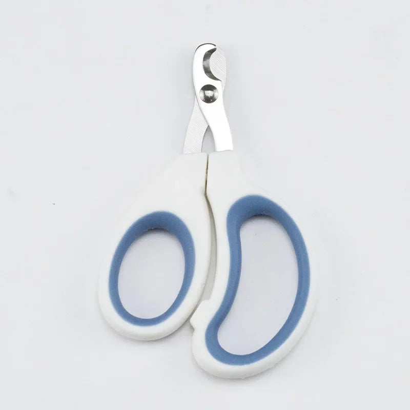 Professional stainless steel cat and dog nail clippers with comfortable white and blue grip for safe, easy pet grooming.