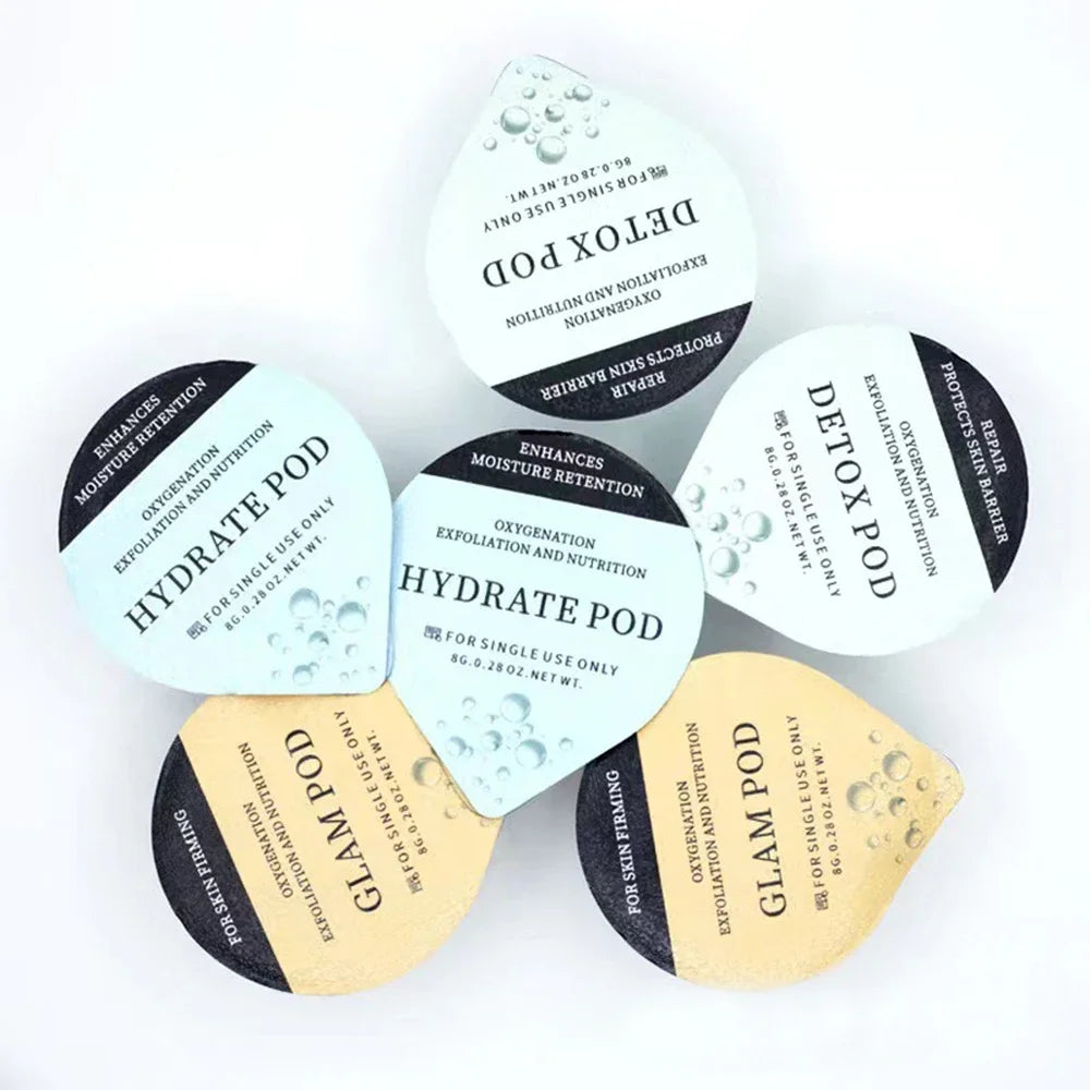 Oxygen facial machine pods for exfoliation, hydration, and skin rejuvenation in detox, hydrate, and glam varieties.