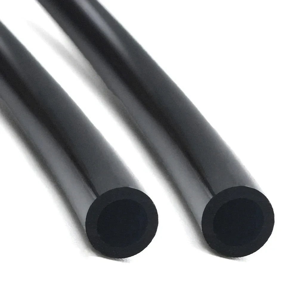 Black drip irrigation tubing with two cut ends, round bore and smooth outer surface