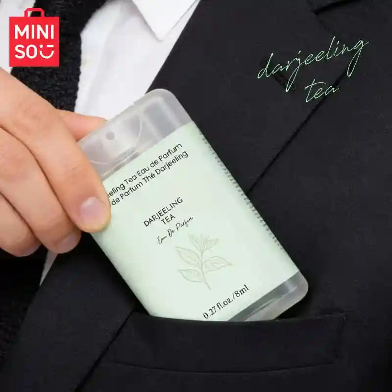 MINISO Darjeeling Tea EDP for men: 8ml portable flat bottle, luxury woody designer fragrance in a suit pocket.