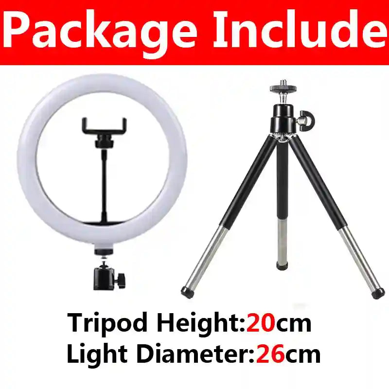 26cm white ring light with phone mount and 20cm black metal tripod for desktop photography and video recording.