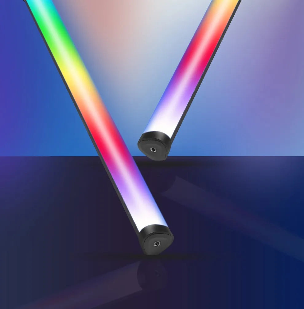 Two slender, cylindrical RGB LED light tubes with black end caps, used for photography and creative video lighting.