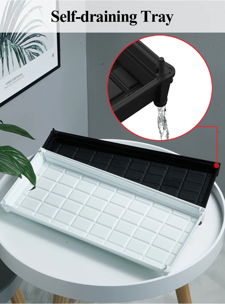 White self-draining plant tray with black insert and water runoff opening