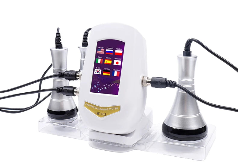 White body slimming machine with touch screen and three silver, bell-shaped handheld applicators on a clear tray.