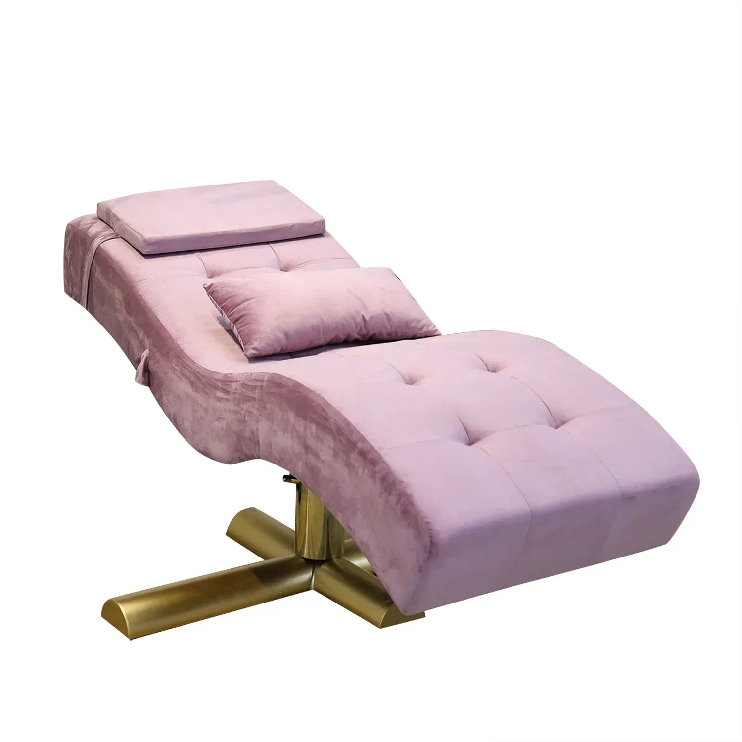 Pink velvet beauty bed with tufted cushioning and a gold metal base, designed for salon or spa treatments.