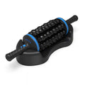 Black cordless muscle massage roller with textured knobs, blue accents, and charging base on a white background.