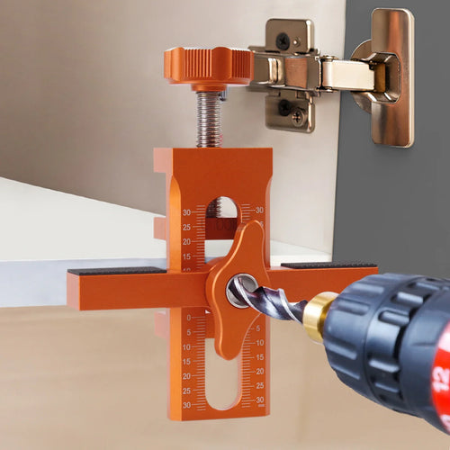Orange cabinet door mounting jig tool with adjustable clamp and guide scale