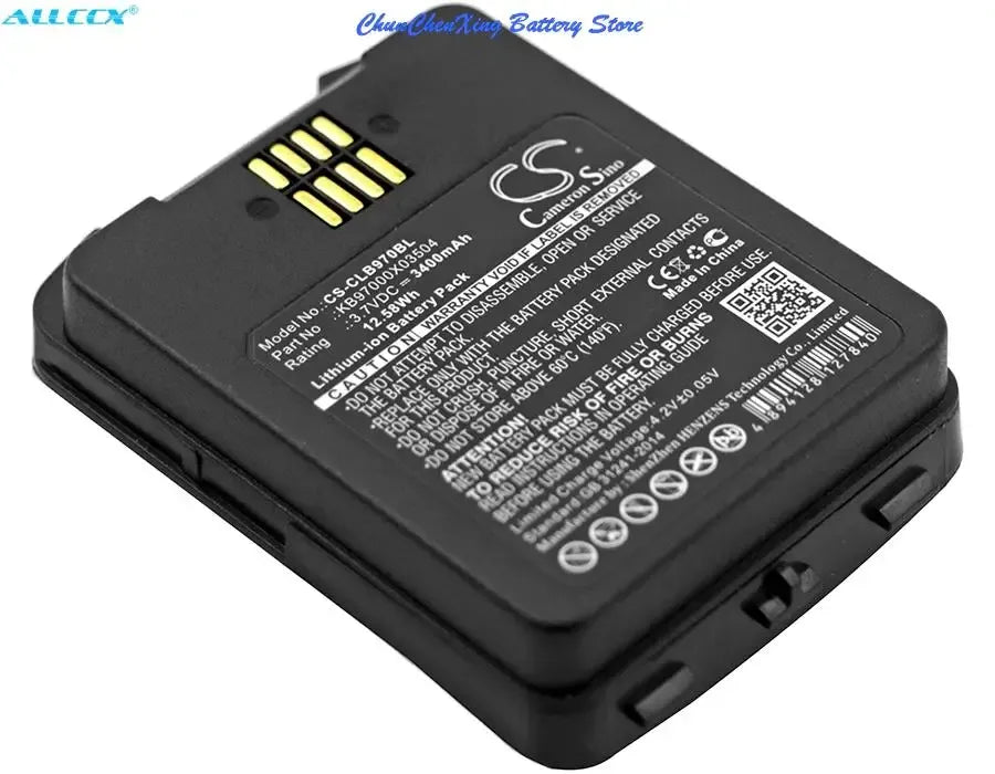 Barcode scanner battery pack with gold contacts and top label, angled close-up
