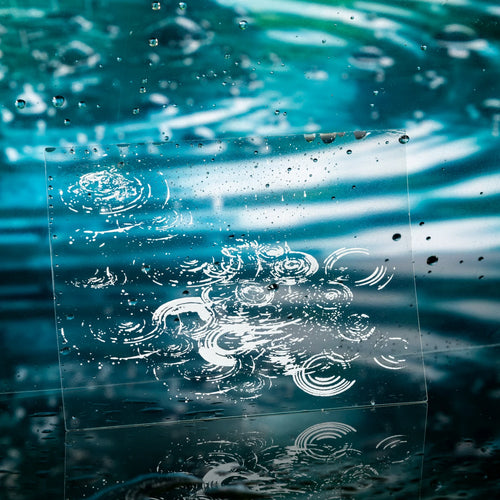 Water ripple PET sticker with blue-green wave and bubbles design