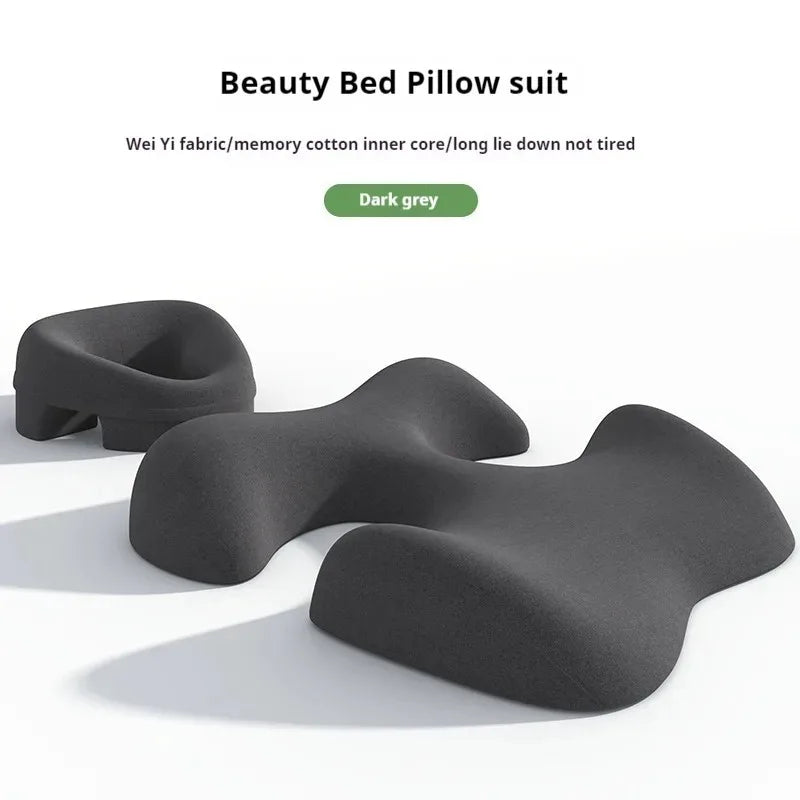 Dark grey memory foam massage pillow set, including a contoured face cushion and a chest support pad for salons.