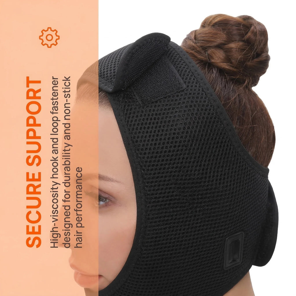 Black mesh electric face heating wrap with velcro fasteners, worn around the jaw to provide secure therapeutic support.
