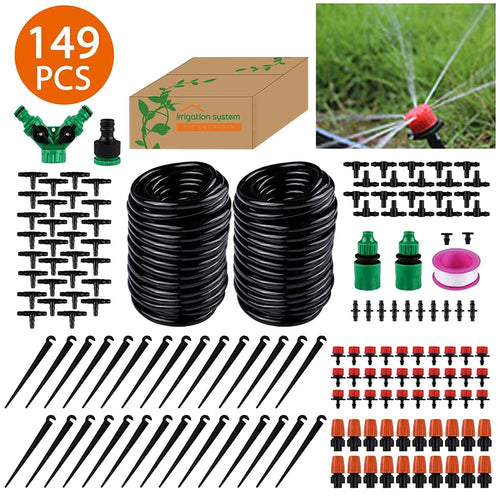 Garden hose irrigation kit with black coils, green connectors, and drip stakes in box